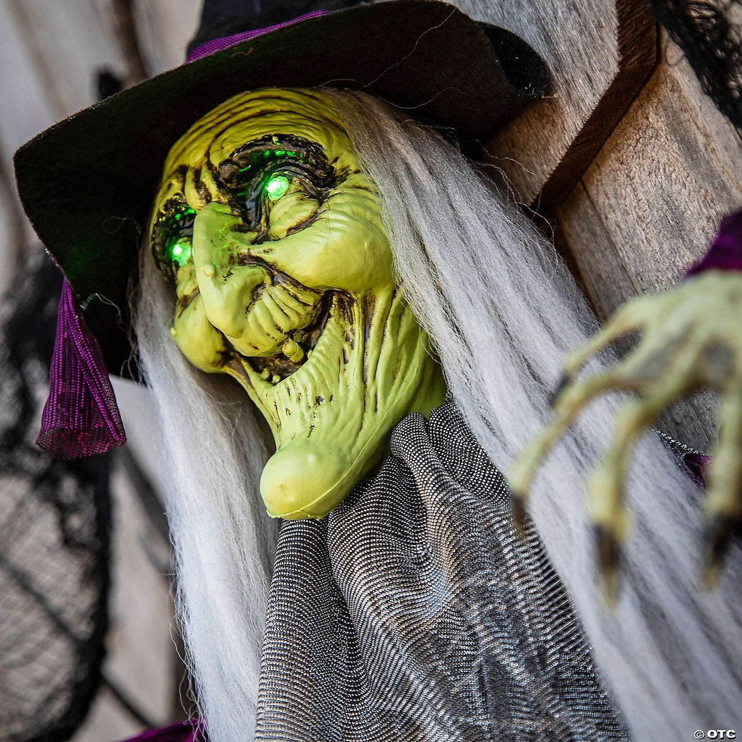4 Ft. Hanging Animated Witch with Green Eyes Halloween Decoration