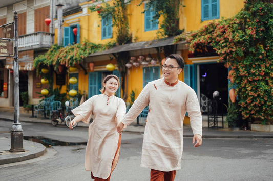 a man and a woman are walking down the street