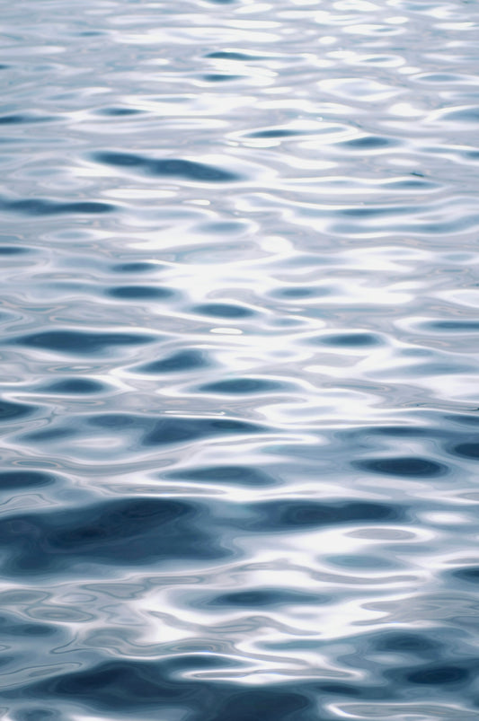 A large body of water with waves on it