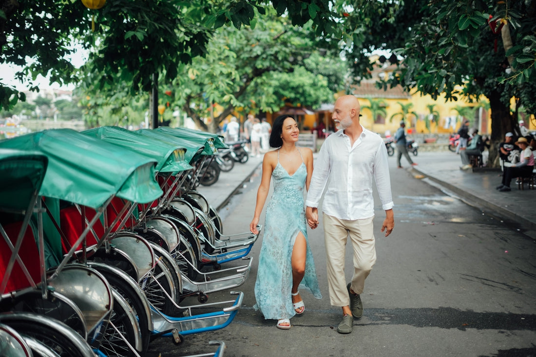 Couple walking hand-in-hand on a street