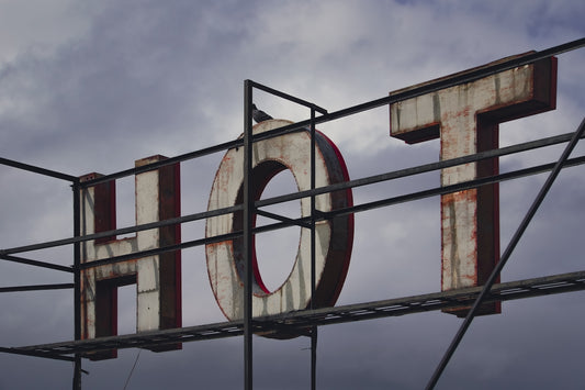 Large weathered letters spell out hot