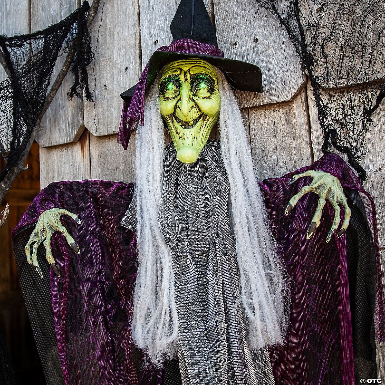 4 Ft. Hanging Animated Witch with Green Eyes Halloween Decoration