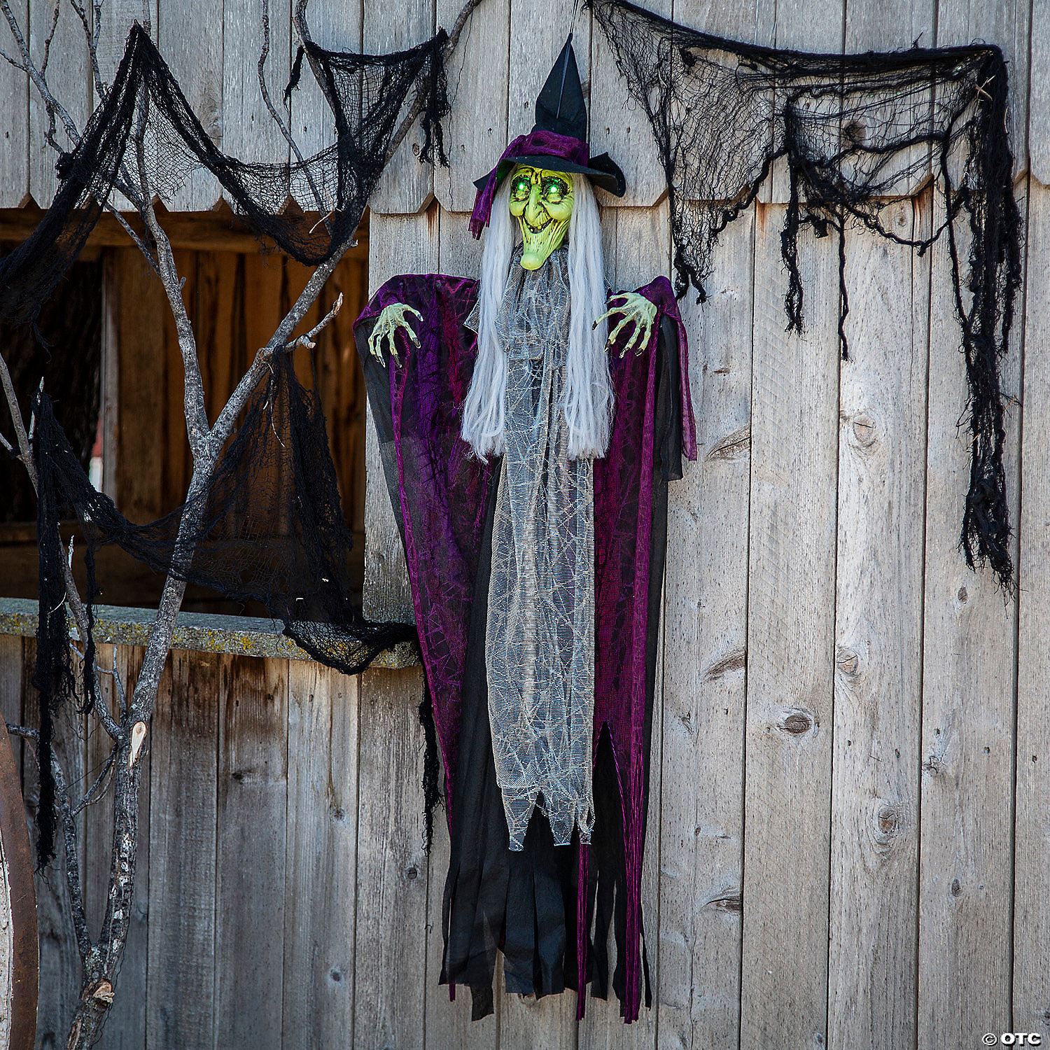 4 Ft. Hanging Animated Witch with Green Eyes Halloween Decoration